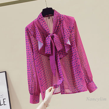 Women's  bow tied long sleeve blouses