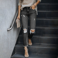 Woman ripped slim fit casual jeans