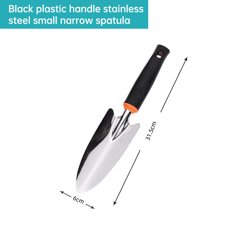 Black plastic handle garden tool