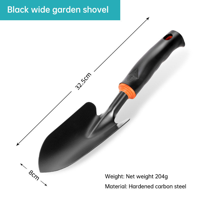 Black plastic handle garden tool